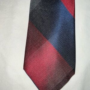 Chaps Men’s Neck Tie. Primary colors are red, blue and gray.